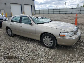 2005 Lincoln Town Car Signature Limited z VIN 1LNHM82W25Y620232, wystawiony jako Copart lot #57701395 z przebiegiem 263 977 mil mil oraz Nie do naprawy. Historia ofert i sprzedaży dostępna na DreamBid. Obrazek 4.