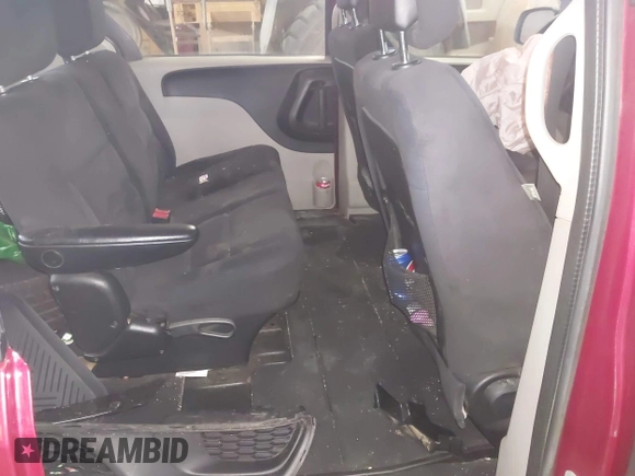 2014 Dodge Grand Caravan SE with VIN 2C4RDGBG5ER379315, listed as a IAAI auction lot 41673071 with 168,569 mi miles and . Bid and sale history available at DreamBid. Image 8.