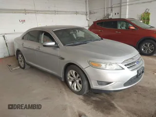 2011 Ford Taurus SEL with VIN 1FAHP2EW6BG170287, listed as a IAAI auction lot 42191702 with 199,477 mi miles. Bid and sale history available at carsss.com. Image 1.
