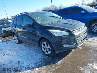 2016 Ford Escape SE with VIN 1FMCU9GX0GUA25455, listed as a IAAI auction lot 41326615 with 137,422 mi miles. Bid and sale history available at carsss.com. Image 1.