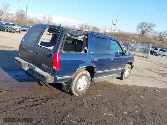1998 Chevrolet Tahoe with VIN 1GNEK13R4WJ371916, listed as a IAAI auction lot 41689311 with 120,749 mi miles. Bid and sale history available at carsss.com. Image 4.