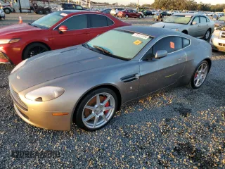 2006 Aston Martin Vantage z VIN SCFBB03B26GC01810, wystawiony jako Copart lot #75127204 z przebiegiem Nie podano mil oraz Nie do naprawy. Historia ofert i sprzedaży dostępna na DreamBid. Obrazek 1.