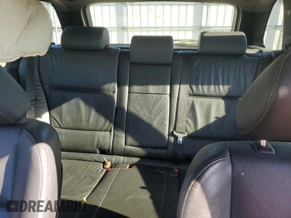 2005 BMW X5 4.4i with VIN 5UXFB53565LV15453, listed as a Copart auction lot 75830774 with 148,211 mi miles and Salvage Title. Bid and sale history available at carsss.com. Image 10.