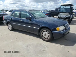 1996 Mercedes-Benz C with VIN WDBHA28E3TF392659, listed as a Copart auction lot 75169934 with Not Provided miles and Salvage Title. Bid and sale history available at carsss.com. Image 4.