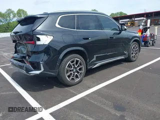 2023 BMW X1 xDrive28i with VIN WBX73EF03P5W15295, listed as a IAAI auction lot 42071192 with 23,326 mi miles and . Bid and sale history available at DreamBid. Image 4.