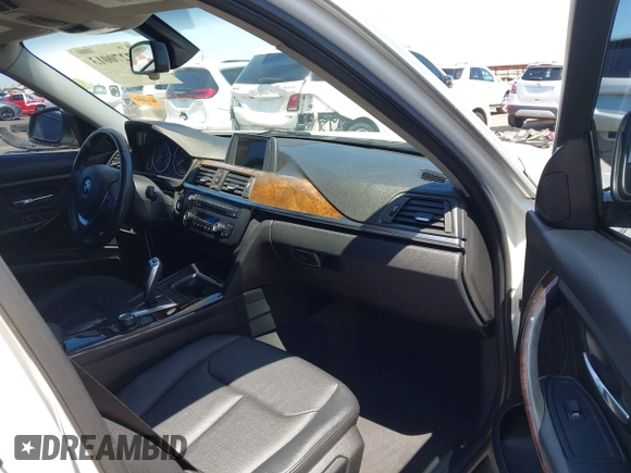 2015 BMW 3 Series 328i with VIN WBA3C1C52FK117753, listed as a IAAI auction lot 42270013 with 147,386 mi miles and . Bid and sale history available at DreamBid. Image 5.