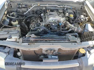 2003 Nissan Frontier SE z VIN 1N6ED29X53C466089, wystawiony jako Copart lot #46733955 z przebiegiem 235 178 mil mil oraz Czysty tytuł • Clean title. Historia ofert i sprzedaży dostępna na DreamBid. Obrazek 11.