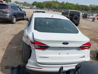 2019 Ford Fusion Hybrid SE with VIN 3FA6P0LU6KR267365, listed as a IAAI auction lot 42030525 with 95,401 mi miles. Bid and sale history available at carsss.com. Image 16.