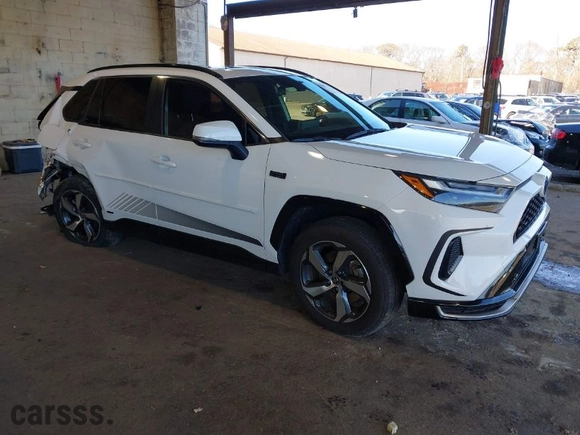 2023 Toyota RAV4 Prime SE with VIN JTMAB3FV1PD127247, listed as a IAAI auction lot 40943223 with 52,678 mi miles. Bid and sale history available at carsss.com. Image 1.