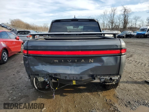 2022 Rivian R1T Adventure Package with VIN 7FCTGAAAXNN005667, listed as a Copart auction lot 44321435 with 48,249 mi miles and Salvage Title. Bid and sale history available at carsss.com. Image 6.