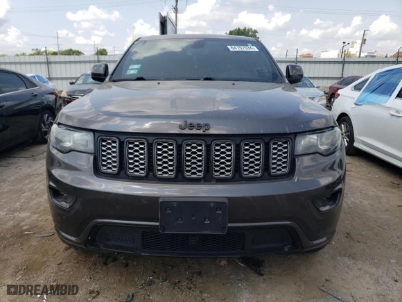 2018 Jeep Grand Cherokee Laredo E with VIN 1C4RJFAG6JC387334, listed as a Copart auction lot 64197034 with 57,992 mi miles and Salvage Title. Bid and sale history available at carsss.com. Image 5.