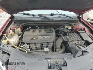 2013 Chrysler 200 Touring z VIN 1C3CCBBB4DN577755, wystawiony jako Copart lot #55904845 z przebiegiem 138 423 mil mil oraz Szkoda całkowita • Salvage title. Historia ofert i sprzedaży dostępna na DreamBid. Obrazek 11.