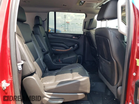 2015 Chevrolet Suburban LTZ with VIN 1GNSKKKC6FR556105, listed as a Copart auction lot 64034304 with 106,269 mi miles and Salvage Title. Bid and sale history available at DreamBid. Image 11.