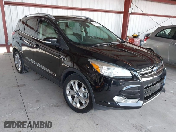 2015 Ford Escape Titanium with VIN 1FMCU0J98FUB95597, listed as a IAAI auction lot 41785188 with 84,141 mi miles. Bid and sale history available at carsss.com. Image 1.