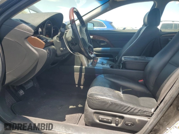 2005 Acura RL with VIN JH4KB16525C003353, listed as a Copart auction lot 61228265 with 150,548 mi miles and Salvage title. Bid and sale history available at DreamBid. Image 7.