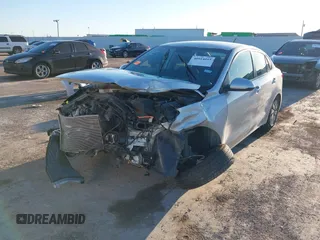 2020 Kia Rio S with VIN 3KPA24AD4LE355322, listed as a IAAI auction lot 40914015 with 50,056 mi miles. Bid and sale history available at carsss.com. Image 6.