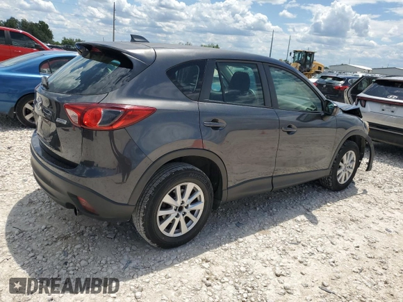 2014 Mazda CX-5 Sport z VIN JM3KE2BE8E0421316, wystawiony jako Copart lot #56548005 z przebiegiem 203 096 mil mil oraz Szkoda całkowita • Salvage title. Historia ofert i sprzedaży dostępna na DreamBid. Obrazek 3.