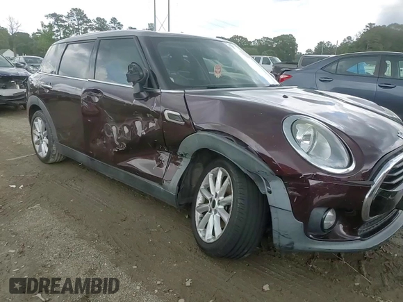 2016 MINI Clubman z VIN WMWLN5C56G2B28065, wystawiony jako Copart lot #54565825 z przebiegiem 129 270 mil mil oraz Szkoda całkowita • Salvage title. Historia ofert i sprzedaży dostępna na DreamBid. Obrazek 13.