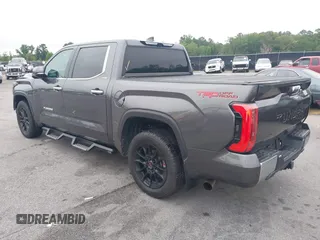 2022 Toyota Tundra Limited with VIN 5TFJA5AB5NX010780, listed as a IAAI auction lot 42446780 with 47,114 mi miles and . Bid and sale history available at DreamBid. Image 3.