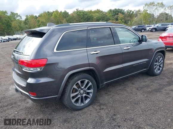 2018 Jeep Grand Cherokee High Altitude with VIN 1C4RJFCGXJC440470, listed as a IAAI auction lot 40459789 with 126,854 mi miles and . Bid and sale history available at DreamBid. Image 4.