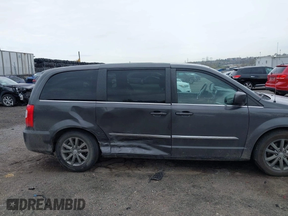 2015 Chrysler Town & Country S with VIN 2C4RC1HG7FR522449, listed as a IAAI auction lot 42021311 with 107,391 mi miles. Bid and sale history available at carsss.com. Image 6.