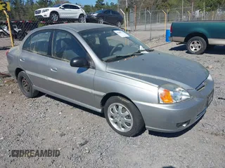 2003 Kia Rio with VIN KNADC125236266545, listed as a IAAI auction lot 41888737 with 114,267 mi miles. Bid and sale history available at carsss.com. Image 1.