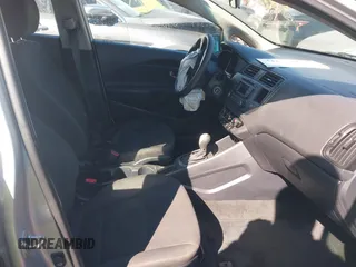 2014 Kia Rio LX with VIN KNADM4A35E6395218, listed as a IAAI auction lot 41614054 with 134,535 mi miles and . Bid and sale history available at DreamBid. Image 5.