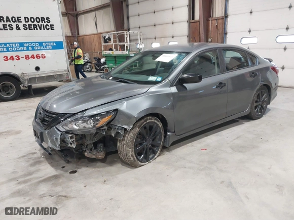 2018 Nissan Altima 2.5 SV with VIN 1N4AL3AP5JC470135, listed as a IAAI auction lot 41801045 with 122,452 mi miles. Bid and sale history available at carsss.com. Image 17.