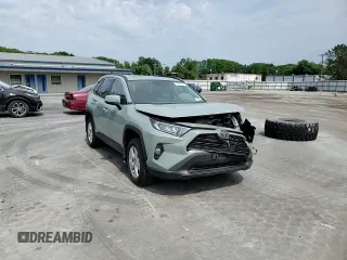 2020 Toyota RAV4 XLE with VIN 2T3P1RFV0LW130251, listed as a Copart auction lot 60625775 with 82,985 mi miles and Salvage title. Bid and sale history available at DreamBid. Image 14.