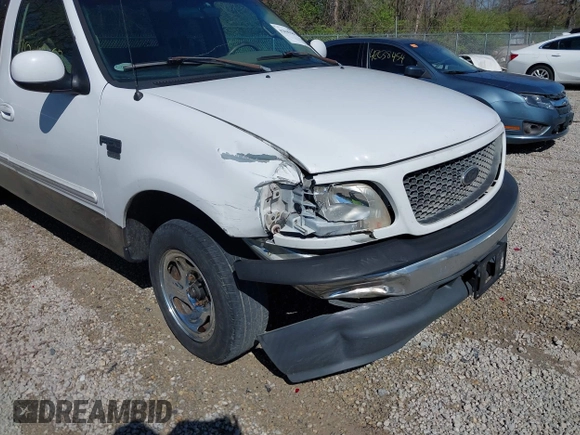 2001 Ford F-150 XL z VIN 1FTRX17L61NB26764, wystawiony jako IAAI lot #42049452 z przebiegiem 242 585 mil mil oraz . Historia ofert i sprzedaży dostępna na DreamBid. Obrazek 6.