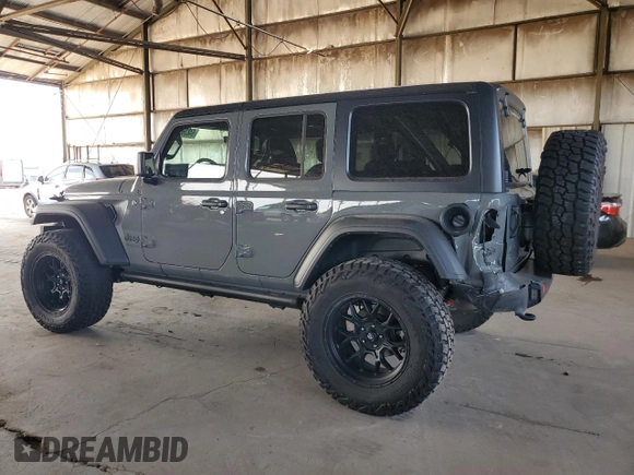 2022 Jeep Wrangler Unlimited High Tide with VIN 1C4HJXDG2NW221829, listed as a Copart auction lot 64836074 with 3,394 mi miles and Salvage Title. Bid and sale history available at DreamBid. Image 2.