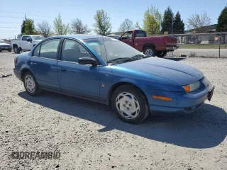 2001 Saturn SL z VIN 1G8ZK547X1Z294553, wystawiony jako Copart lot #53786805 z przebiegiem 288 011 mil mil oraz Szkody całkowita. Historia ofert i sprzedaży dostępna na DreamBid. Obrazek 4.