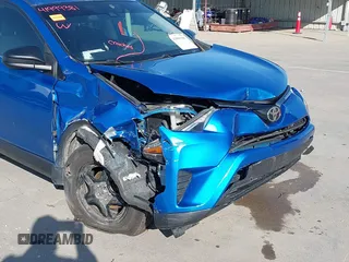 2017 Toyota RAV4 LE with VIN JTMZFREV4HJ115558, listed as a IAAI auction lot 41999381 with 94,223 mi miles and . Bid and sale history available at carsss.com. Image 6.
