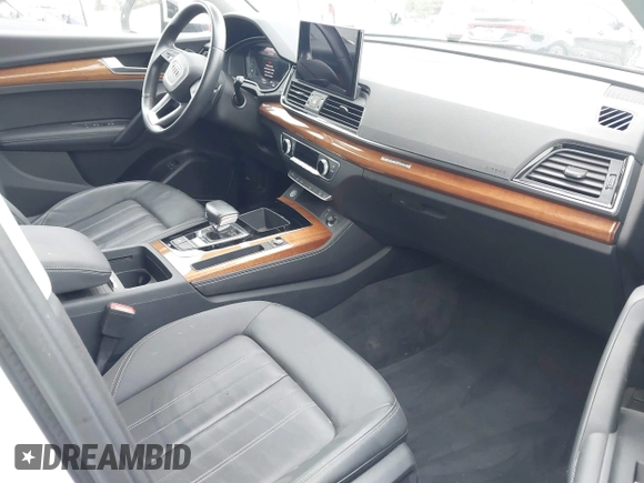 2021 Audi Q5 Premium Plus z VIN WA1E2AFY5M2071265, wystawiony jako IAAI lot #42348388 z przebiegiem 25 924 mil mil oraz . Historia ofert i sprzedaży dostępna na DreamBid. Obrazek 5.