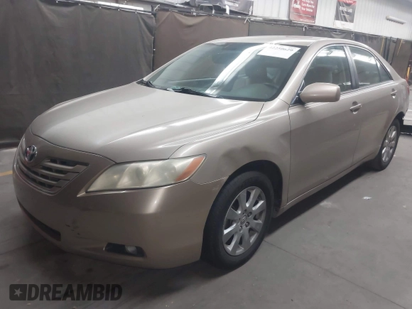 2007 Toyota Camry LE z VIN 4T1BK46K27U006559, wystawiony jako IAAI lot #42250629 z przebiegiem 175 389 mil mil oraz . Historia ofert i sprzedaży dostępna na DreamBid. Obrazek 18.