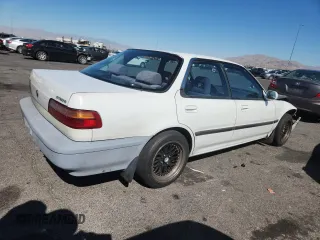 1992 Acura Integra with VIN JH4DB1649NS000455, listed as a Copart auction lot 62386755 with 209,785 mi miles and Salvage title. Bid and sale history available at DreamBid. Image 3.