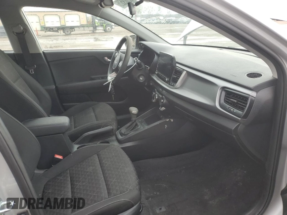 2023 Kia Rio S z VIN 3KPA24AD5PE516136, wystawiony jako Copart lot #52609525 z przebiegiem 52 379 mil mil oraz Szkoda całkowita • Salvage title. Historia ofert i sprzedaży dostępna na DreamBid. Obrazek 7.