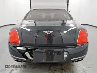 2013 Bentley Flying Spur z VIN SCBBP9ZA4DC081659, wystawiony jako Copart lot #57568525 z przebiegiem 102 570 mil mil oraz Czysty tytuł • Clean title. Historia ofert i sprzedaży dostępna na DreamBid. Obrazek 6.