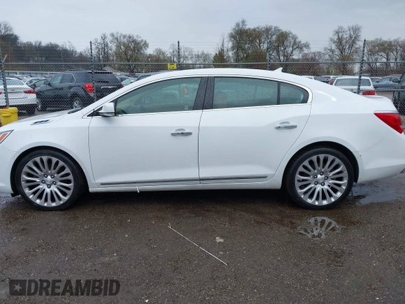 2014 Buick LaCrosse Premium II with VIN 1G4GF5G39EF305460, listed as a IAAI auction lot 41951229 with 127,188 mi miles and . Bid and sale history available at DreamBid. Image 14.