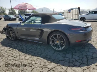 2019 Porsche 718 Boxster z VIN WP0CA2A80KS211281, wystawiony jako Copart lot #68340883 z przebiegiem 27 151 mil mil oraz . Historia ofert i sprzedaży dostępna na DreamBid. Obrazek 2.
