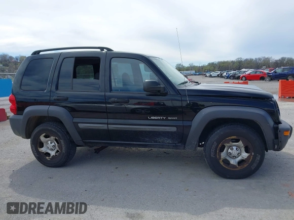 2003 Jeep Liberty Sport with VIN 1J4GL48KX3W530569, listed as a IAAI auction lot 41857397 with 172,303 mi miles. Bid and sale history available at carsss.com. Image 13.