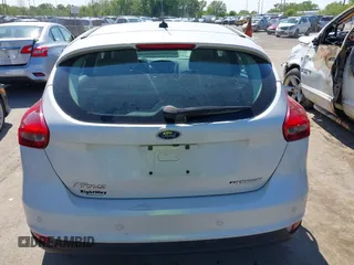 2018 Ford Focus Titanium with VIN 1FADP3N24JL279449, listed as a IAAI auction lot 42297780 with 144,479 mi miles and . Bid and sale history available at DreamBid. Image 16.