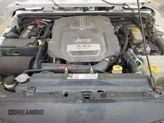2012 Jeep Wrangler Unlimited Sport z VIN 1C4BJWDG4CL140250, wystawiony jako Copart lot #55174665 z przebiegiem 91 285 mil mil oraz Szkoda całkowita • Salvage title. Historia ofert i sprzedaży dostępna na DreamBid. Obrazek 12.