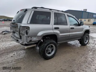 1999 Jeep Grand Cherokee Laredo with VIN 1J4GW58SXXC553547, listed as a Copart auction lot 50786405 with 151,968 mi miles and Salvage Title. Bid and sale history available at carsss.com. Image 3.