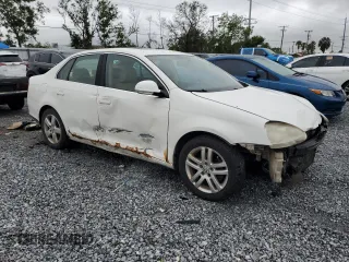 2009 Volkswagen Jetta Sedan SE with VIN 3VWRM71K69M097152, listed as a Copart auction lot 52293505 with 207,114 mi miles and Salvage Title. Bid and sale history available at carsss.com. Image 4.