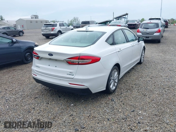 2020 Ford Fusion SE with VIN 3FA6P0LU5LR151074, listed as a IAAI auction lot 42146290 with 98,574 mi miles and . Bid and sale history available at carsss.com. Image 4.