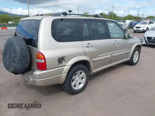 2003 Suzuki XL-7 Touring with VIN JS3TY92V634103506, listed as a IAAI auction lot 41593602 with 176,477 mi miles. Bid and sale history available at carsss.com. Image 4.