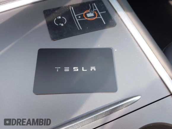 2023 Tesla Model Y Performance with VIN 7SAYGDEF3PF711497, listed as a IAAI auction lot 41877450 with 21,887 mi miles and . Bid and sale history available at DreamBid. Image 11.