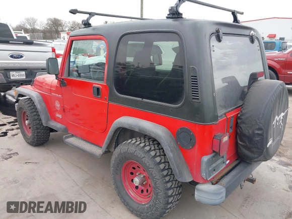 1998 Jeep Wrangler SE with VIN 1J4FY29P2WP791317, listed as a IAAI auction lot 41748523 with 169,052 mi miles. Bid and sale history available at carsss.com. Image 3.