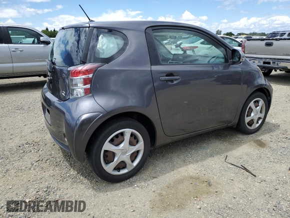 2012 Scion iQ z VIN JTNJJXB06CJ009187, wystawiony jako Copart lot #56563665 z przebiegiem 105 014 mil mil oraz Szkoda całkowita • Salvage title. Historia ofert i sprzedaży dostępna na DreamBid. Obrazek 3.